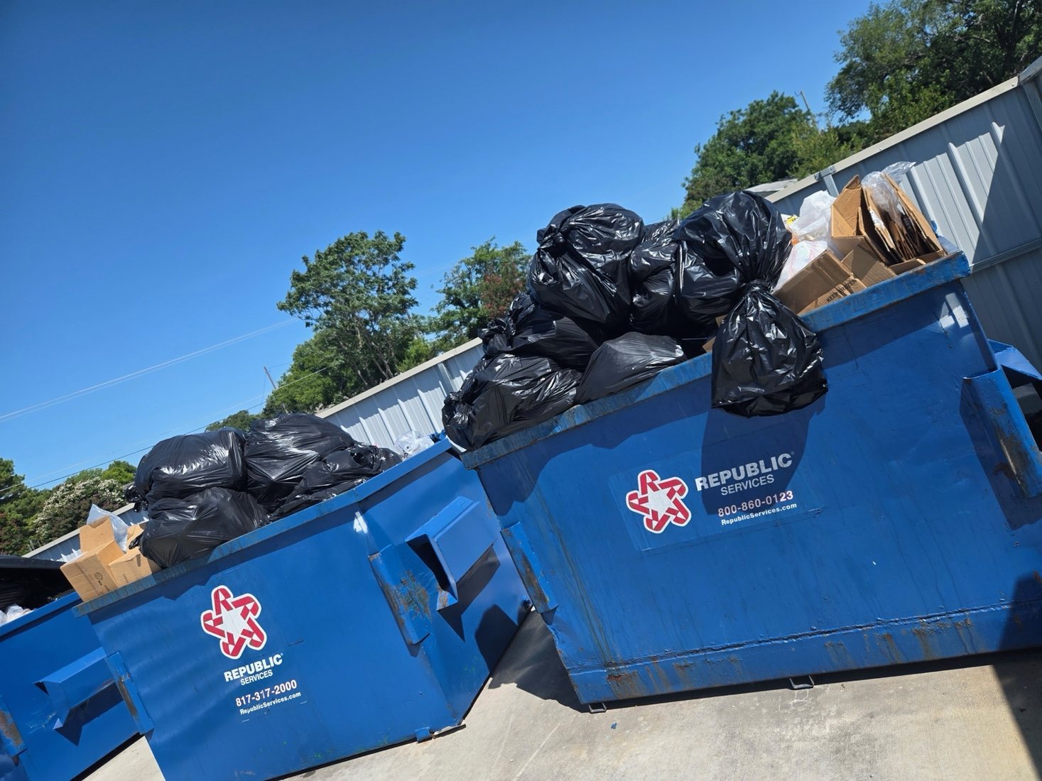 Full dumpsters during cleanup